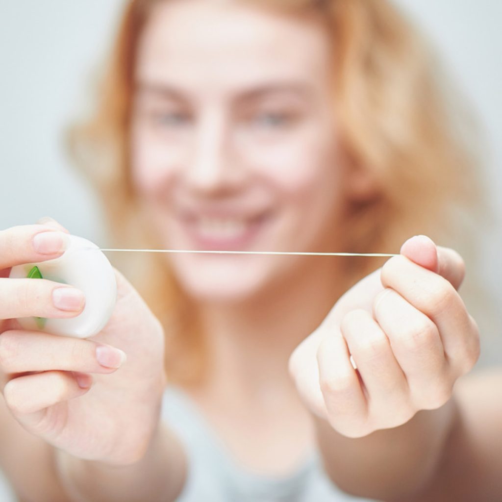 How to floss properly and why-Newcastle dentists tell us how